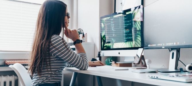 Woman looking at computer