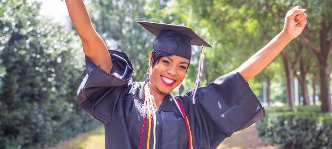 Ashworth graduate celebrating.