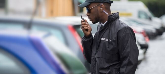 Security manager talking on phone